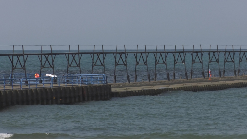 Lighthouse at St. Josephs, Michigan. Pan shot from left to right, along catwalk, ending with lighthouse framed on right side