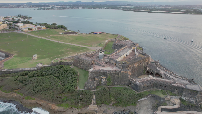 Castillo San Felipe del Morro Atop Cliffside Promontory In San Juan, Puerto Rico. - aerial