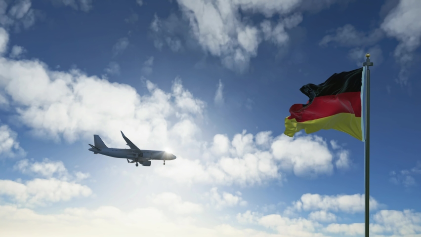 Generic airplane landing in Germany. A passenger plane lowering its landing gears as it approaches a German airport. 