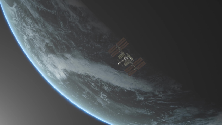 ISS International Space Station Slowly Orbiting Planet Earth with Sun Flare 4K