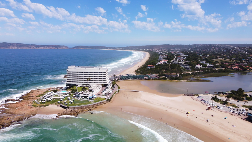 Drone view over pristine beaches in Plettenberg Bay, Garden Route, South Africa Royalty-Free Stock Footage #1097675025