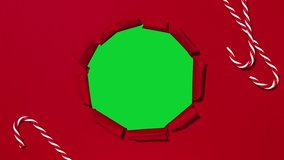 Red packaging paper unwrapping from the center revealing a green screen or white background - Stop Motion Animation. Chroma key. Space for text. Mockup. - Powered by Shutterstock - Get 15% off with code: PIKWIZARD15