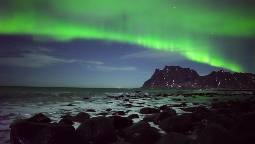 Capturing A Real-Time Aurora Borealis (Northern Lights) At Uttakleiv Beach, Lofoten Islands, Norway. - Wide Shot | Shutterstock HD Video #1097699787