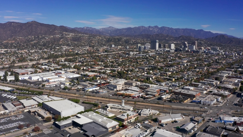 High and wide aerial panning shot of downtown Glendale, California. 4K