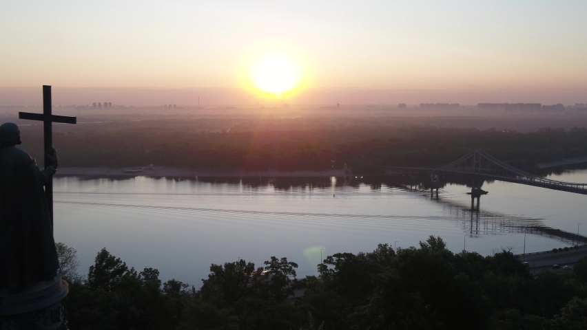 Monument to Volodymyr the Great - the baptizer of Kievan Rus. Dawn. Ukraine. Kyiv. View of the Dnieper River. Aerial. 