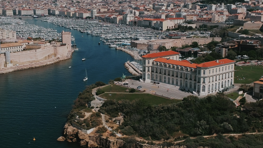 Aerial View Of Palais du Pharo Overlooking Seafront In Marseille, France. pullback