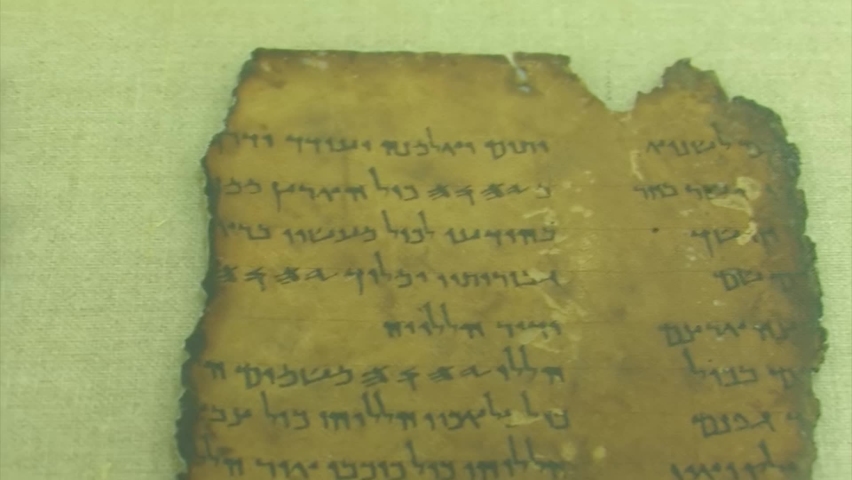 Dead sea scrolls close view behind frame, Israel
translate: An orphan and a widow will be encouraged, these are from heaven Royalty-Free Stock Footage #1097716255