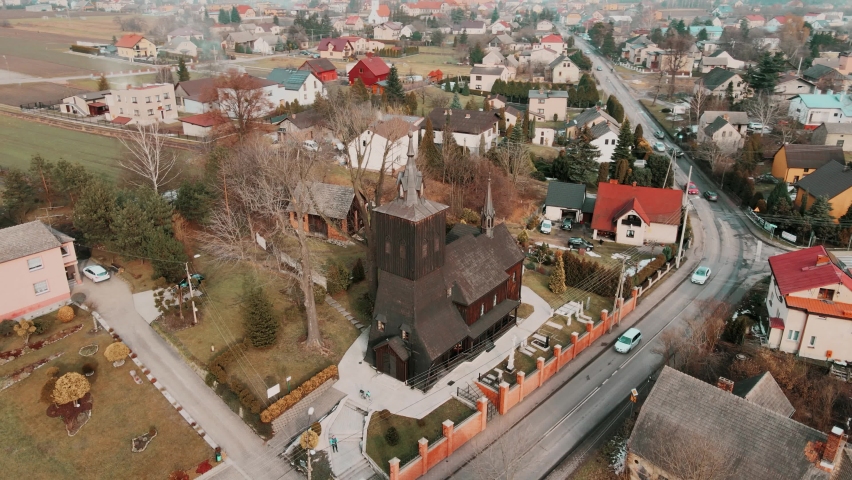 old wooden historic church in Gołkowice, Silesia, Poland, winter aerial view
