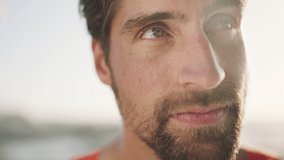 Man, face and travel, thinking with outdoor view and adventure on Portugal beach, serious and thoughtful with wellness and peace. Calm, healing and vision, relax and self reflection in nature. - Powered by Shutterstock - Get 15% off with code: PIKWIZARD15