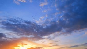 Timelapse of Burning sky and shining, Red purple orange blue pink. Romantic colorful sky and clouds. winter sky. natural motion background. weather and the movement of nature concept. 4K UHD
 - Powered by Shutterstock - Get 15% off with code: PIKWIZARD15