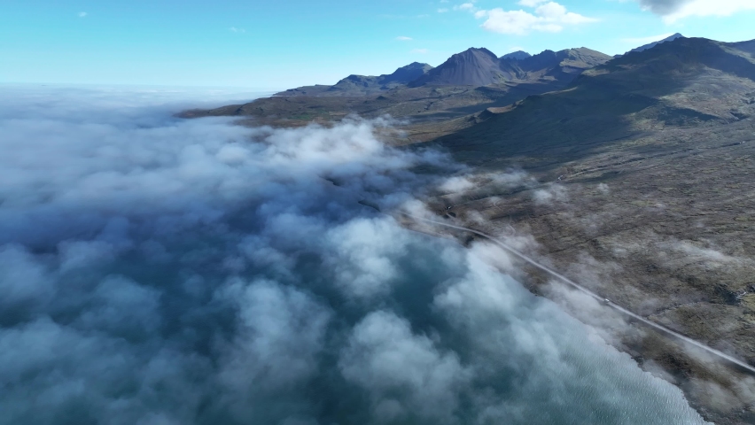 Low Clouds At Faskrudsfjordur Fjord In East Iceland - aerial drone shot