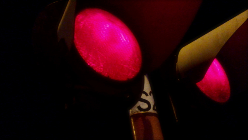 Railway traffic lights flashing red. Train lamp warning. Public transport safety sign. Royalty-Free Stock Footage #1097754523