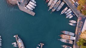 Aerial view of amazing old port. Seascape with boats and sea in marina bay. Top view of the harbor. Drone video footage