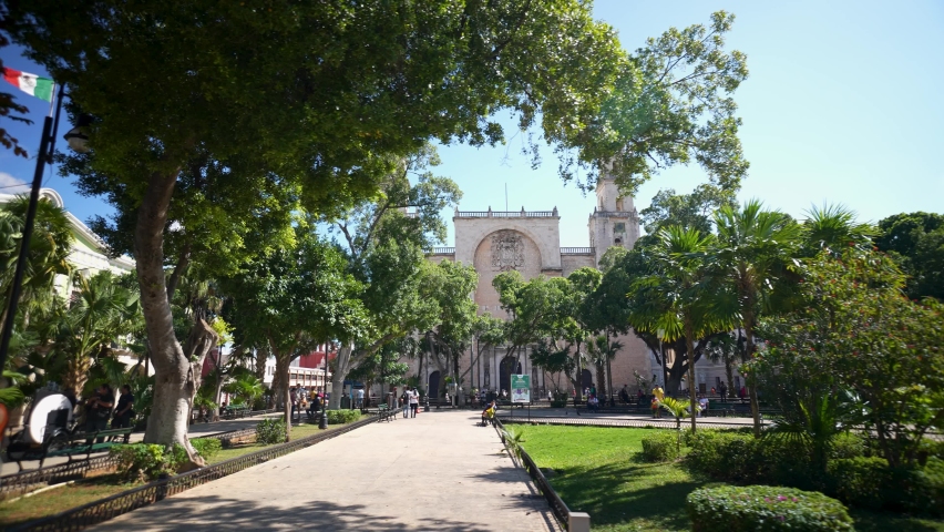 Camera dolly to the right showing the Plaza Grande and Cathedral of Ildefonso in Merida, Yucatan, Mexico.