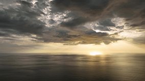 Dramatic color sunset above sea aerial view 4 K