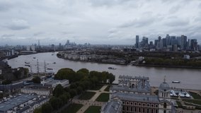 Scenic Drone Aerial Footage of London, including Canary Wharf, Isle of Dogs, Queen's House, Greenwich Park and Royal Observatory.