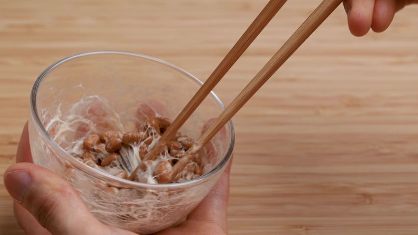 4K slow motion video with NATTO mixed in. Royalty-Free Stock Footage #1097779561