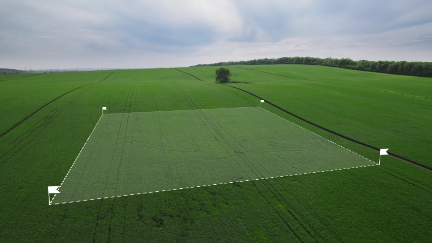 Land surveying in a field. Division of land for future sale and development.