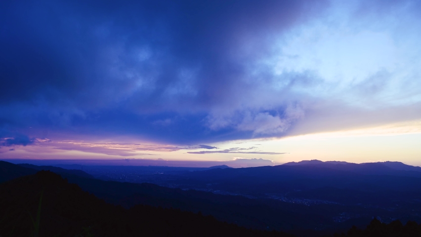 Enjoy a romantic colorful sunset from the top of the mountain. Blue sky orange evening sunset. Wufen Mountain, Ruifang District, New Taipei City, Taiwan
