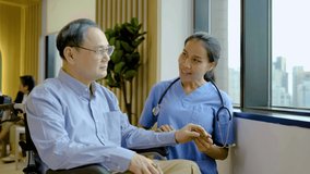 Asian female doctor or nurse treats elderly patient suffering from depression he was sitting in a wheelchair. The concept of senior patients, depressive disorders in the elderly. senior health care - Powered by Shutterstock - Get 15% off with code: PIKWIZARD15