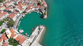Aerial drone video of iconic fortified port in historic city of Nafpaktos, Aitoloakarnania, Greece