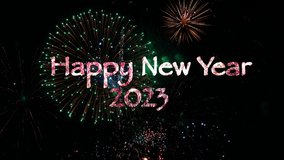 Happy New Year 2023 seasonal background of fireworks illumination in midnight sky. Firework sparkler banner, 4K video