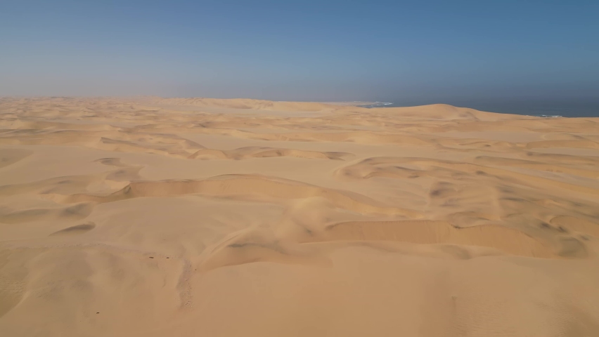 Namibia Desert. Aerial View Sand Dunes near Walvis Bay and Swakopmund. Skeleton Coast. Namibia. Africa. Royalty-Free Stock Footage #1097830141