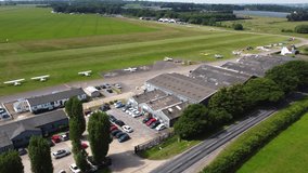 Aerial view of Stapleford Airport hangers, aircraft and flight line, Essex, UK