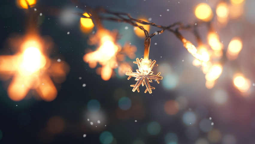 Christmas snowflakes lights with falling snow, snowflakes, Winter and new year holidays. copy space. Royalty-Free Stock Footage #1097854859