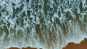 Texture of sea waves water surface, Dynamic shot Aerial view of green sea surface at Phuket Thailand, Beautiful waves sea surface seashore Amazing nature and travel background