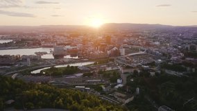 Inscription on video. Oslo, Norway. City view during sunset. Back light. The central part of the city. Glitch effect text, Aerial View