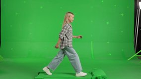 happy Caucasian child walking run on a Green Screen, Chroma Key. 4k UHD side view video. - Powered by Shutterstock - Get 15% off with code: PIKWIZARD15