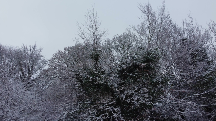 High angle view of Snow covered landscape and Cityscape, Aerial Footage of Luton City of England UK after Snow Fall. The 1st Snow Fall of this Winter of 2022