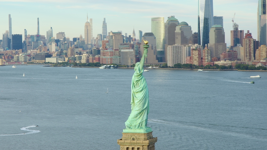 
Aerial Circling Beautiful Statue Of Liberty with Manhattan New York City Skyline In Background. United States. High Quality Footage Shot from Helicopter. Royalty-Free Stock Footage #1097882791