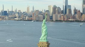 
Aerial Circling Beautiful Statue Of Liberty with Manhattan New York City Skyline In Background. United States. High Quality Footage Shot from Helicopter.