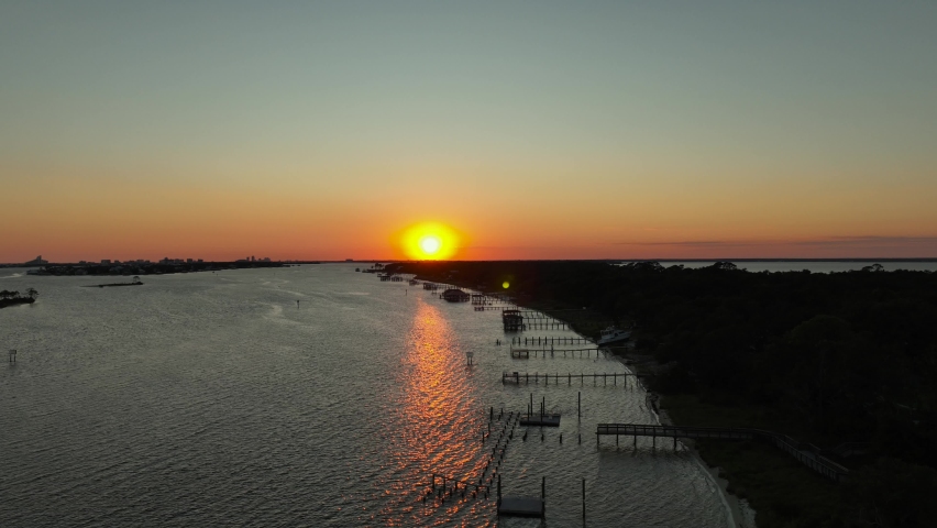 Aerial view of sunset over inlet waterway near Wolf Bay