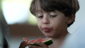 Small boy eating watermelon fruit. Child eats healthy snack food - Powered by Shutterstock - Get 15% off with code: PIKWIZARD15