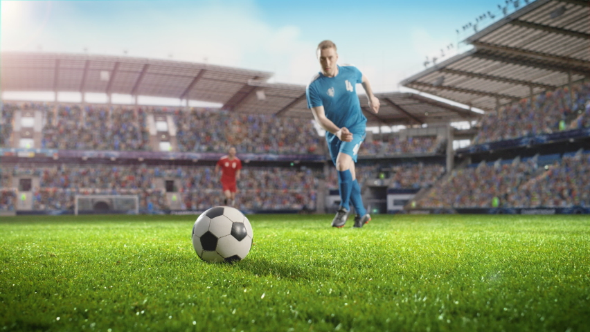 Football World Championship: Soccer Player Runs, Kicks the Ball. Ball Shoots, Grass Sprays Outwards, Full Stadium Crowd Cheers. Camera Moves in Arc Super Slow Motion. Cinematic Shot Captures Victory
 | Shutterstock HD Video #1097909489