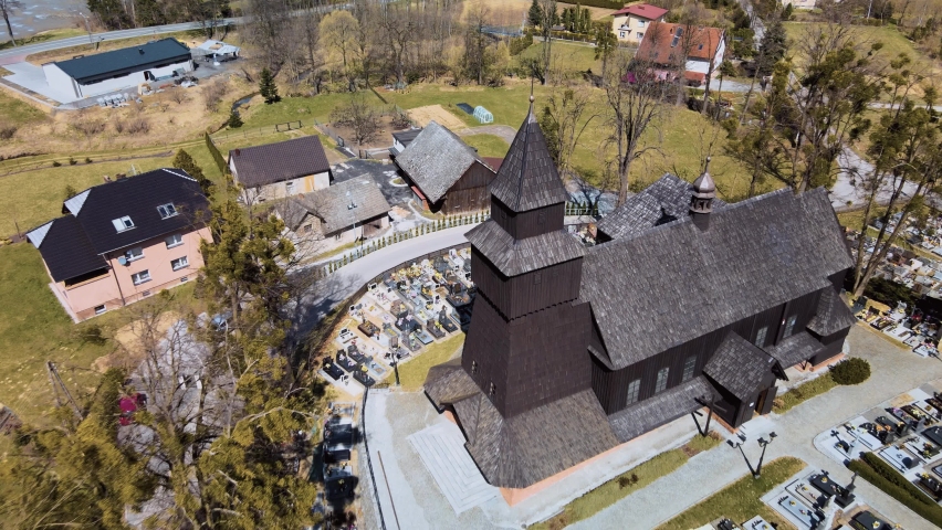 Wooden historic church in Pielgrzymowice, Silesia, Poland, early spring aerial view