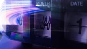 Time lapse of calendar clock in 1 year in futuristic lighting. Time travel concept. - Powered by Shutterstock - Get 15% off with code: PIKWIZARD15