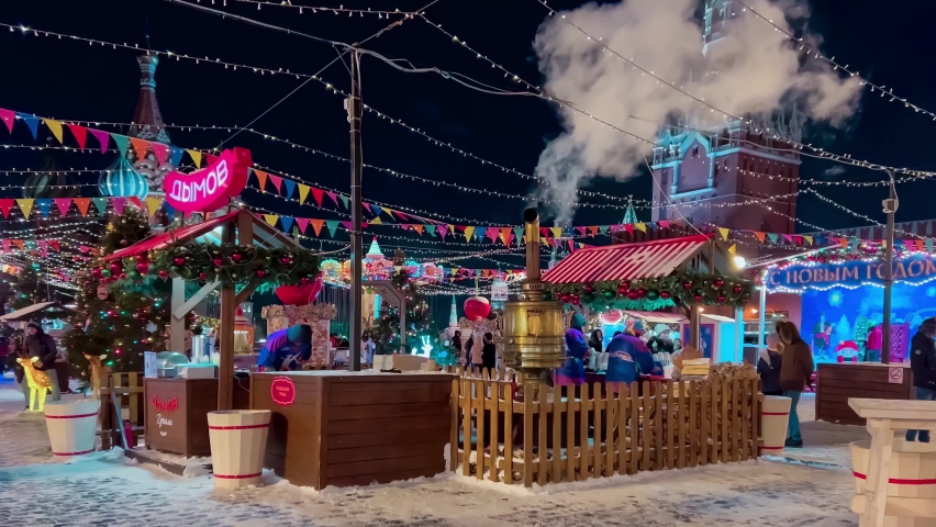Street decorated for New Year and Christmas.Night winter snow Moscow, Russia, December 19, 2021