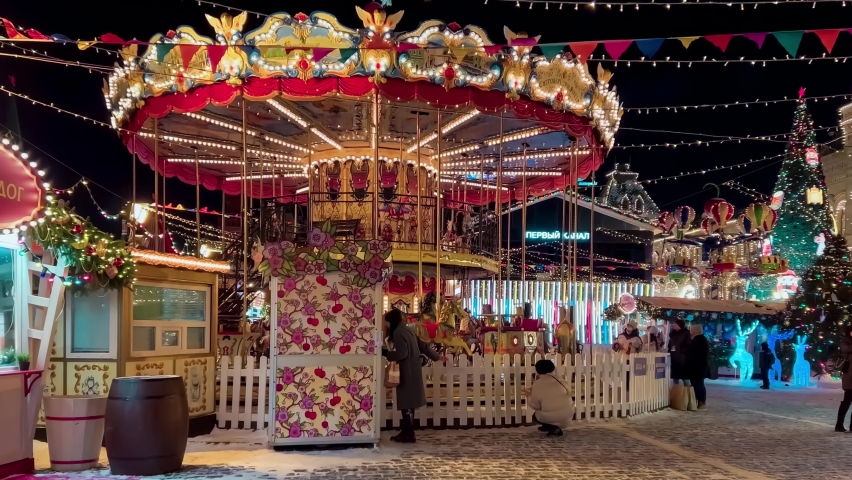 Street decorated for New Year and Christmas.Night winter snow Moscow, Russia, December 19, 2021