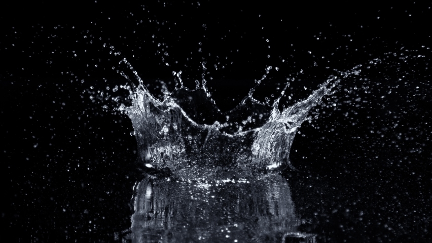 Super Slow Motion Shot of Water Crown Splash Isolated on Black Background at 1000fps.