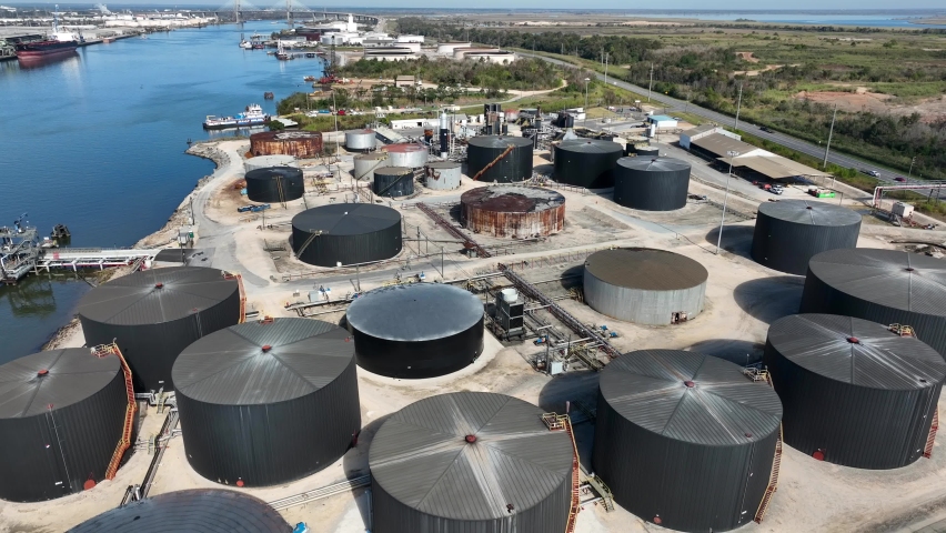Oil terminal at port in Mobile Alabama USA. Gasoline diesel and home heating oil tanks filled for shipment at Gulf Coast.