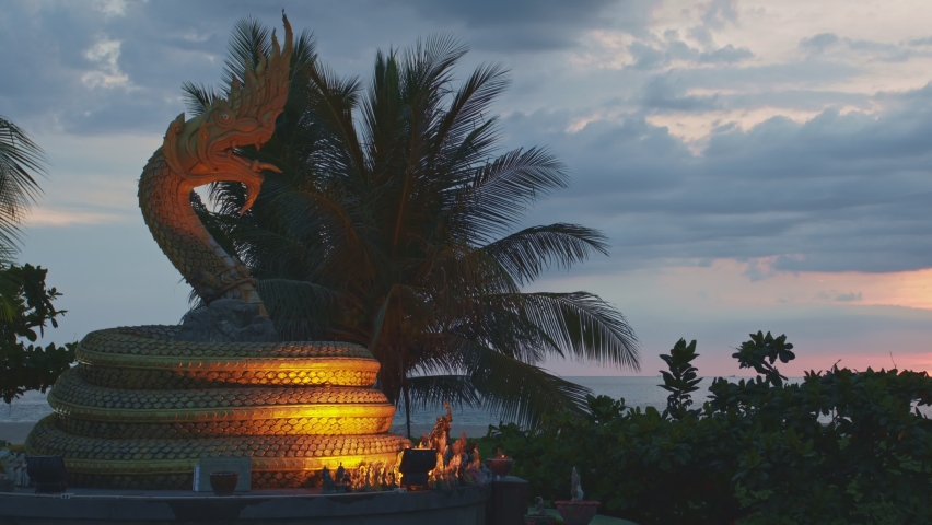 beautiful sunset behind the great Naga statue in Karon beach Phuket Thailand
The blue hues of the sky are unusually beautiful in sunset.
cloud scape background. 4k stock footage in travel concept. Royalty-Free Stock Footage #1097932171