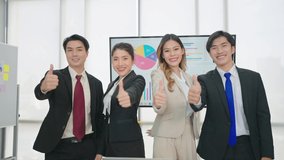 Happy face of professional business team show thumbs up standing and looking at camera in office - Powered by Shutterstock - Get 15% off with code: PIKWIZARD15