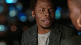 Drink, date and face with a black man and woman talking in a pub while dating together at night. Bars, drinking and conversation with a male and female enjoying nightlife while bonding on a weekend - Powered by Shutterstock - Get 15% off with code: PIKWIZARD15