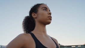 Black woman, runner and breathing for fitness wellness and resting after outdoor cardio workout in city. Tired african woman, breath hard and sports health training vision for marathon motivation - Powered by Shutterstock - Get 15% off with code: PIKWIZARD15