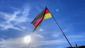 Belgium flag waving with blue sky in the background - Powered by Shutterstock - Get 15% off with code: PIKWIZARD15