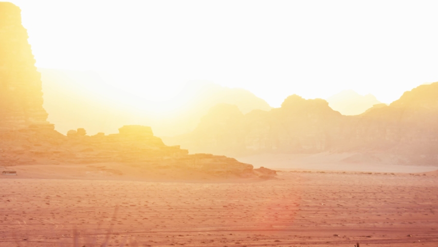 Zoom in Planet Mars like landscape sunset timelapse - Photo of Wadi Rum desert in Jordan with red pink sky above, this location was used as set for many science fiction movies